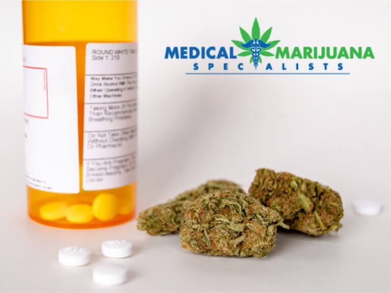 marijuana and bottle of prescription pills